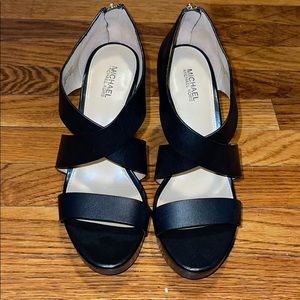 Size 6.5 Michael Kors black leather wedges